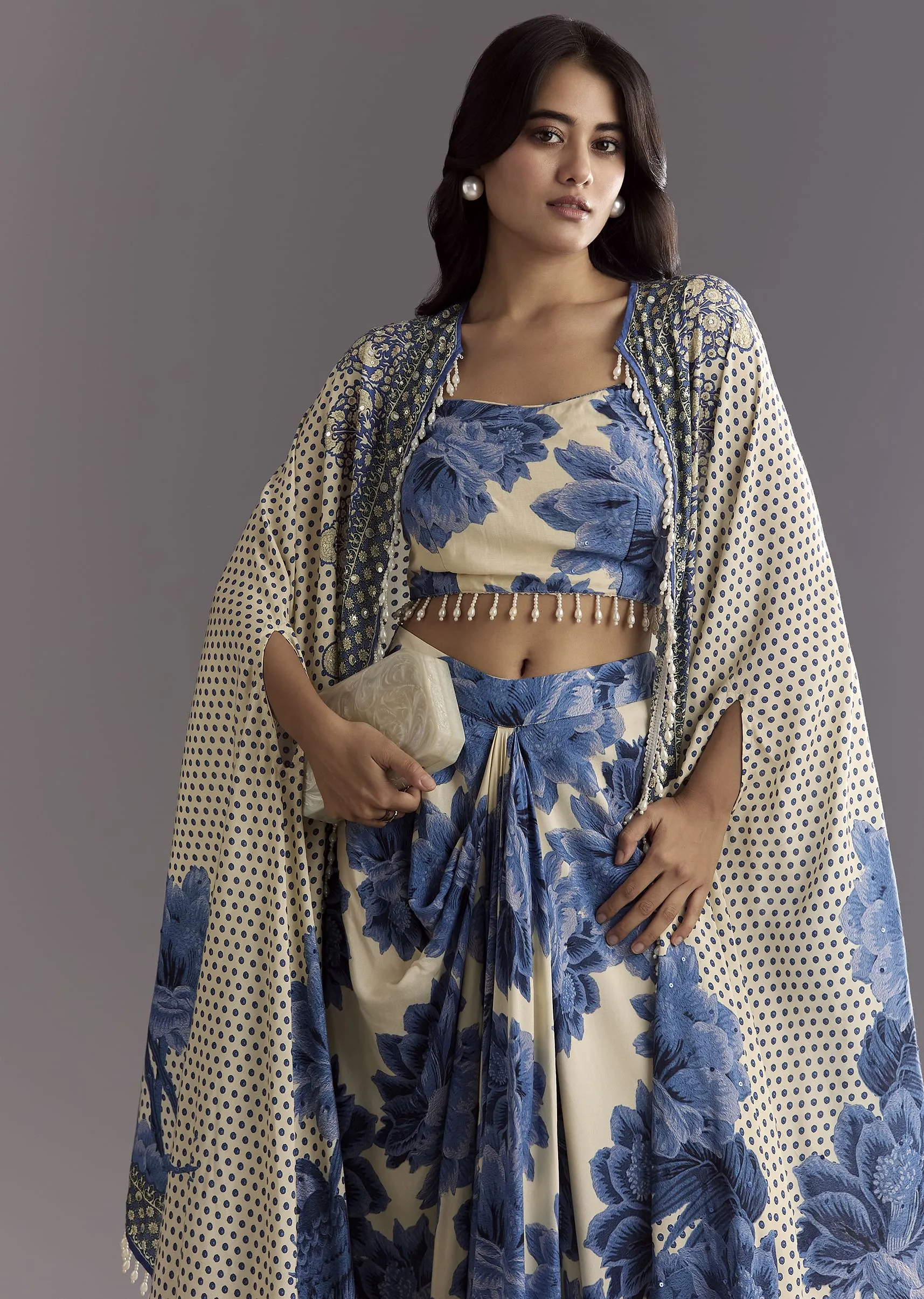 Cream Blue Floral Printed Croptop Skirt With Tassel Bordered Cape