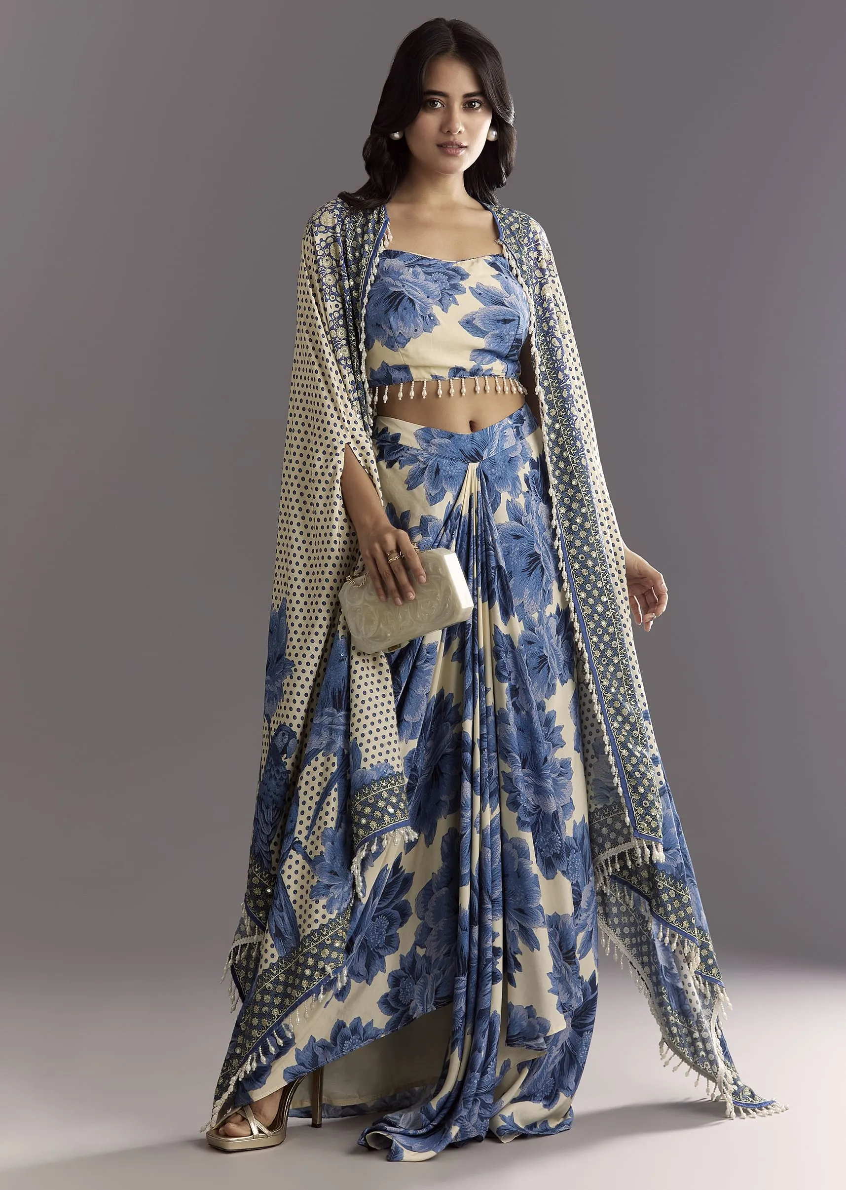 Cream Blue Floral Printed Croptop Skirt With Tassel Bordered Cape