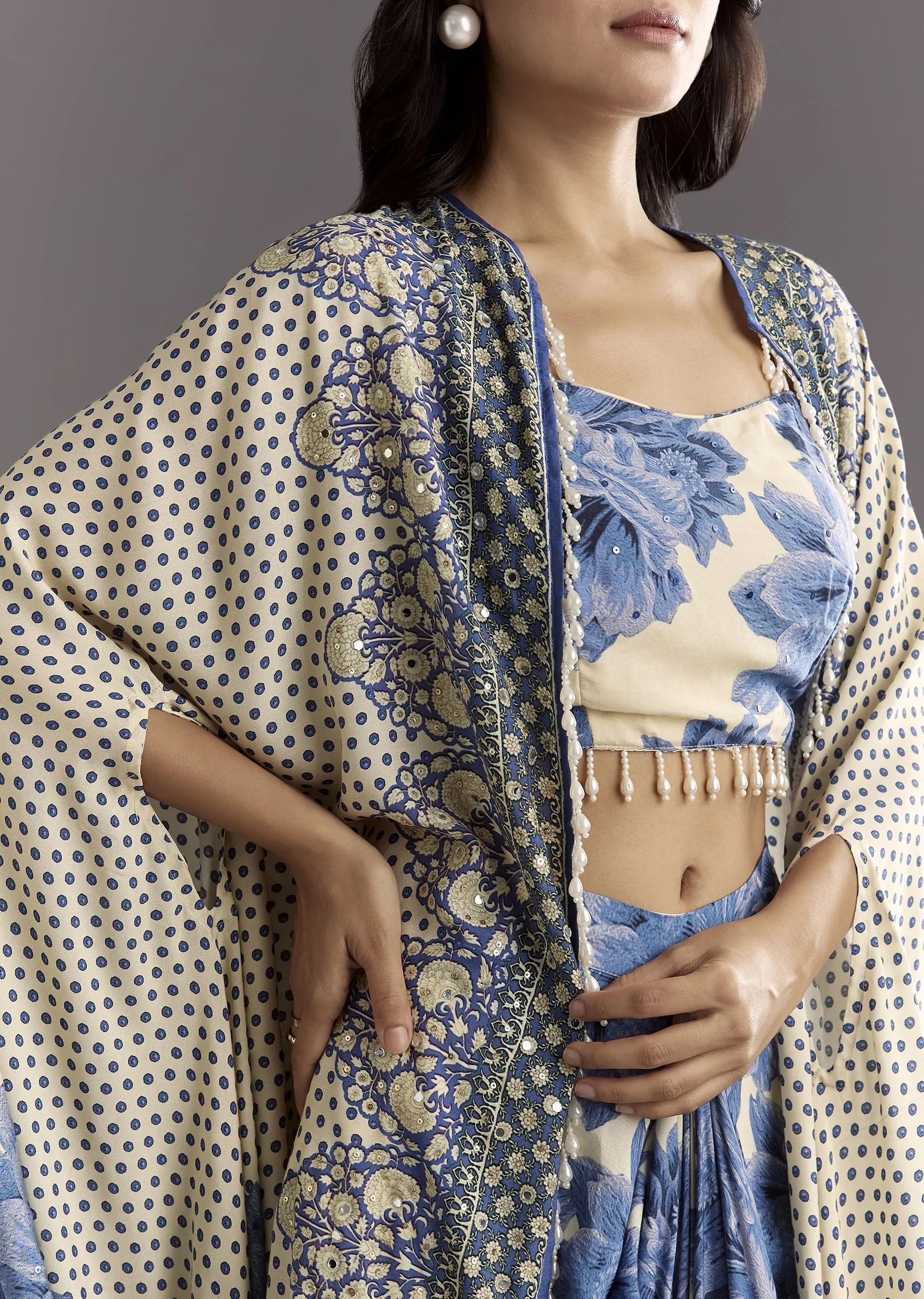 Cream Blue Floral Printed Croptop Skirt With Tassel Bordered Cape