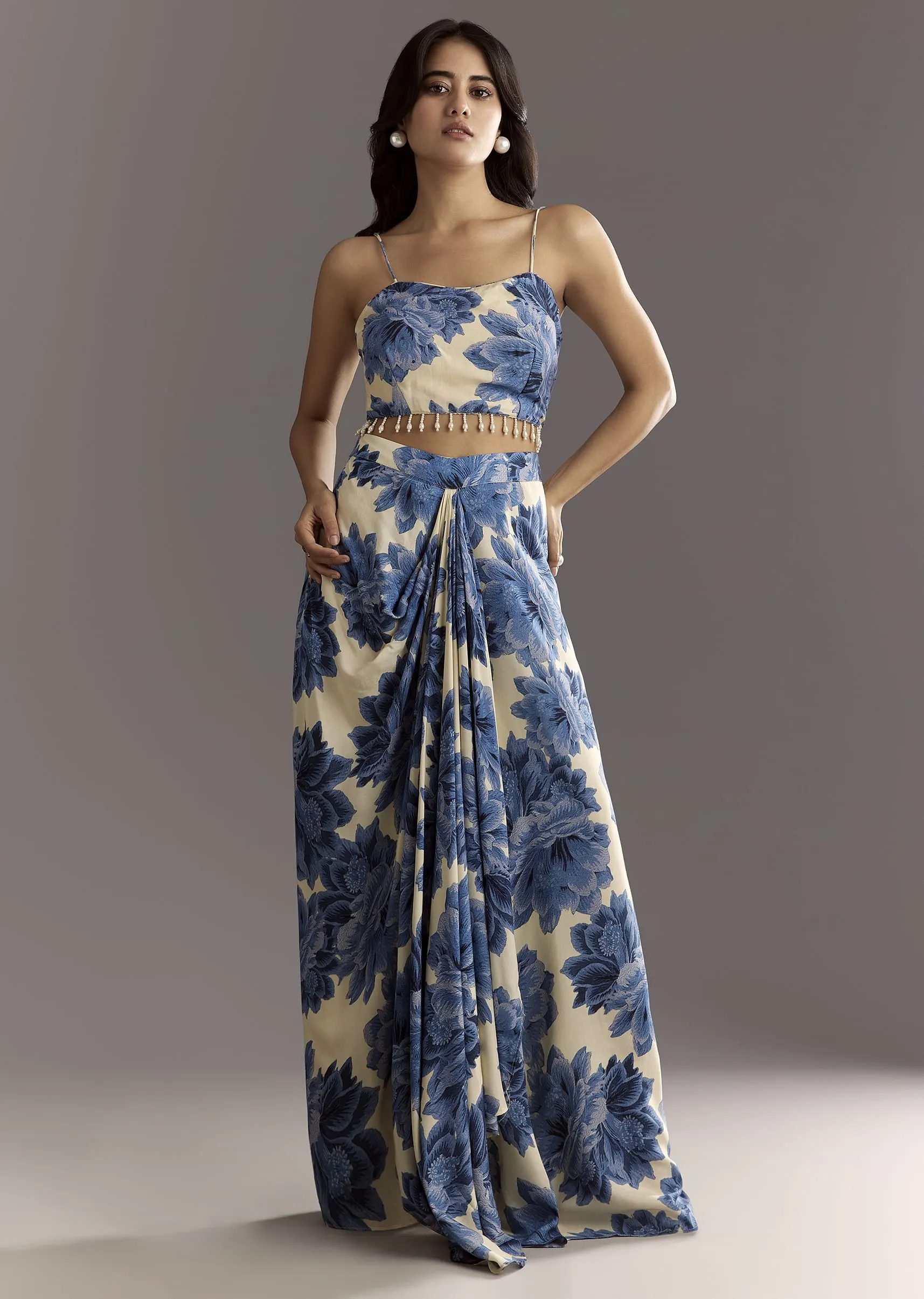 Cream Blue Floral Printed Croptop Skirt With Tassel Bordered Cape