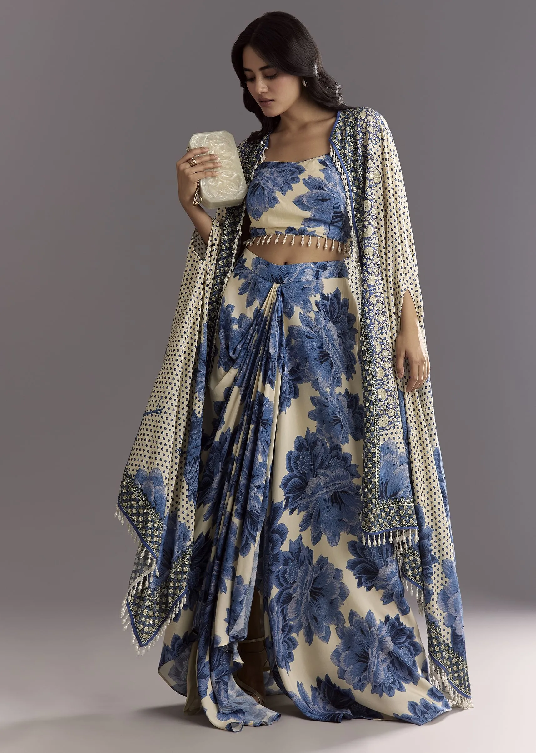 Cream Blue Floral Printed Croptop Skirt With Tassel Bordered Cape